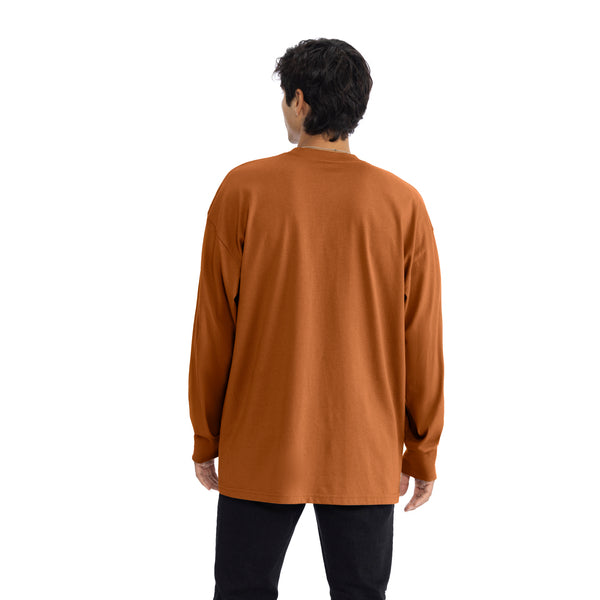 Introducing our Heavyweight Long Sleeve Ringspun Cotton T-Shirt: crafted for durability and comfort. Made from premium ringspun cotton, it offers unmatched softness. Versatile and timeless, it's an essential addition to any wardrobe.